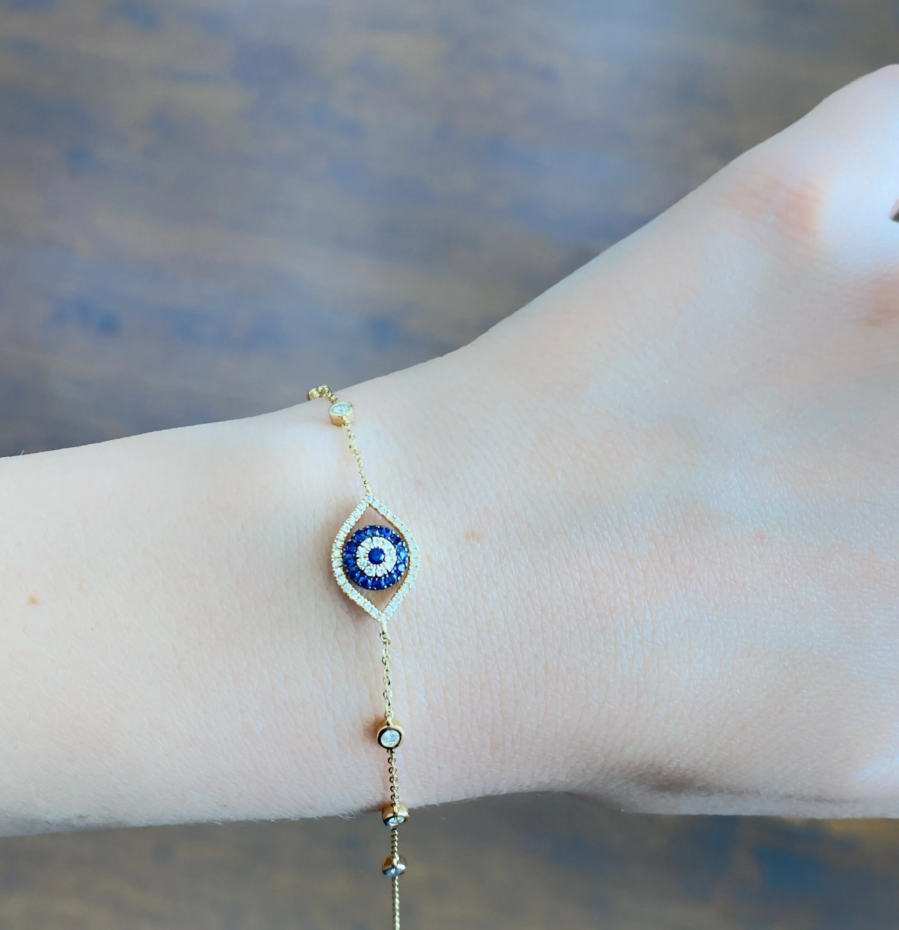 0.32CT Diamond / 0.15CT Blue Sapphire Eye Bracelet