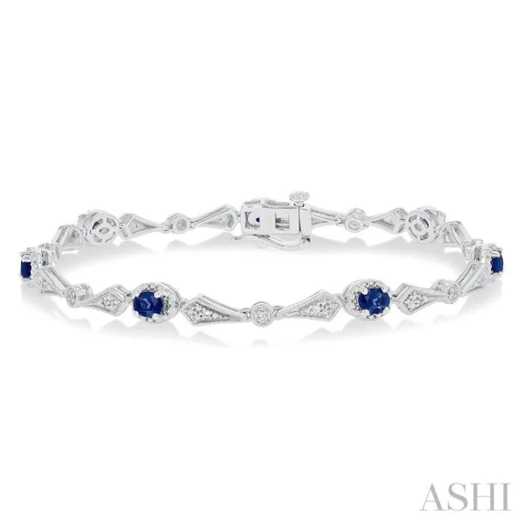 1/10 ctw Oval Cut 4X3MM Sapphire and Round Cut Diamond Precious Bracelet in 10K White Gold