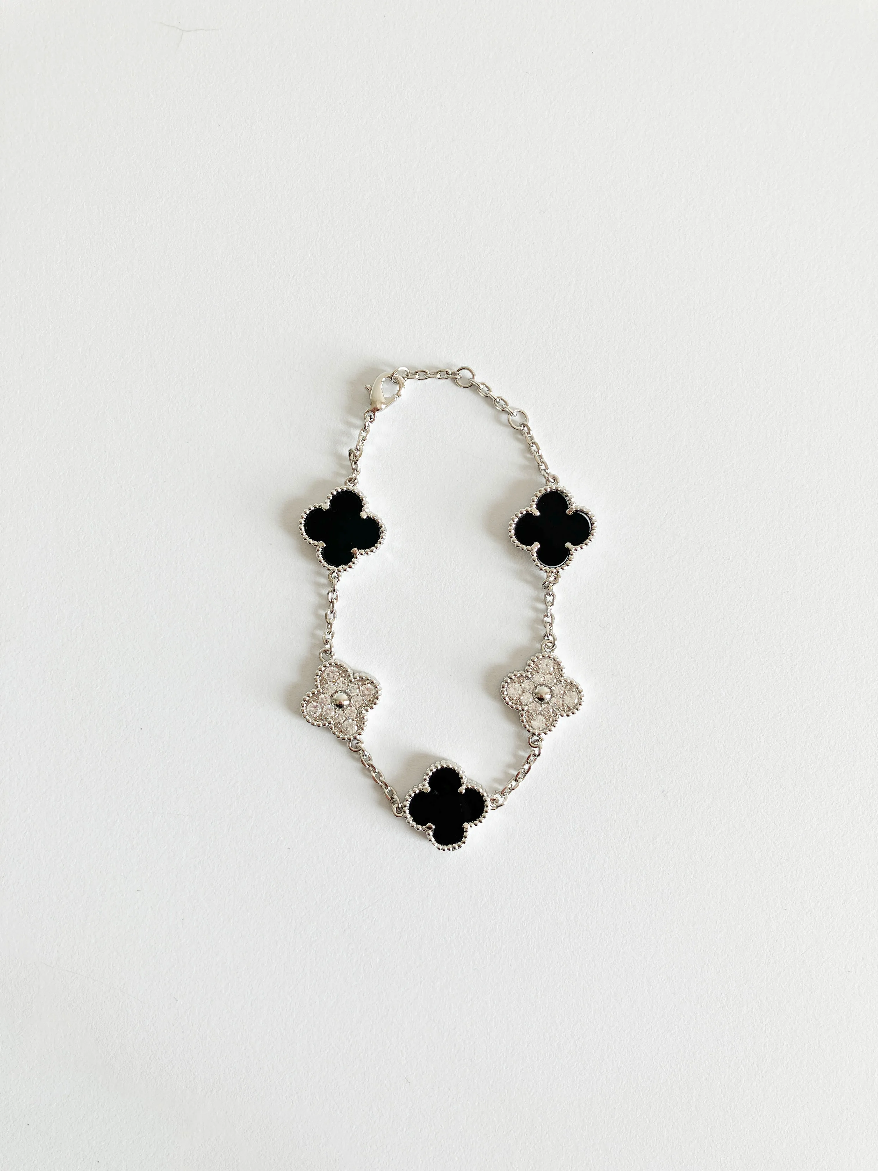 Cubic Zirconia and Onyx Demi Quatrefoil Bracelet in Silver