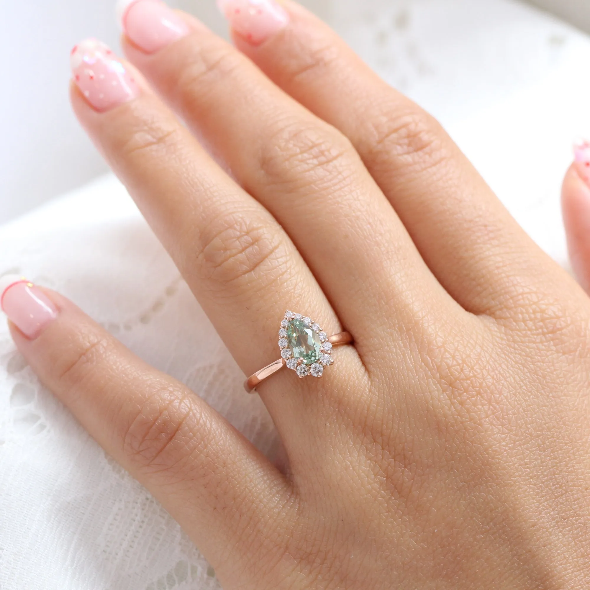 Pear Seafoam Green Sapphire Ring in Tiara Halo Diamond Tapered Band